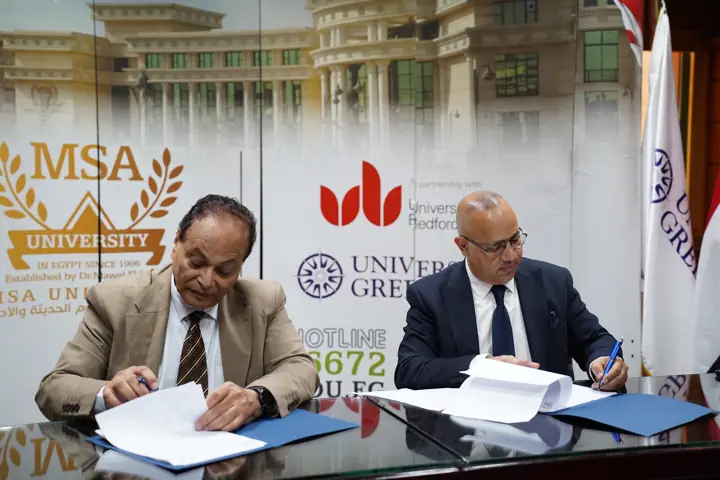 Both sides sign the protocol documents at MSA University